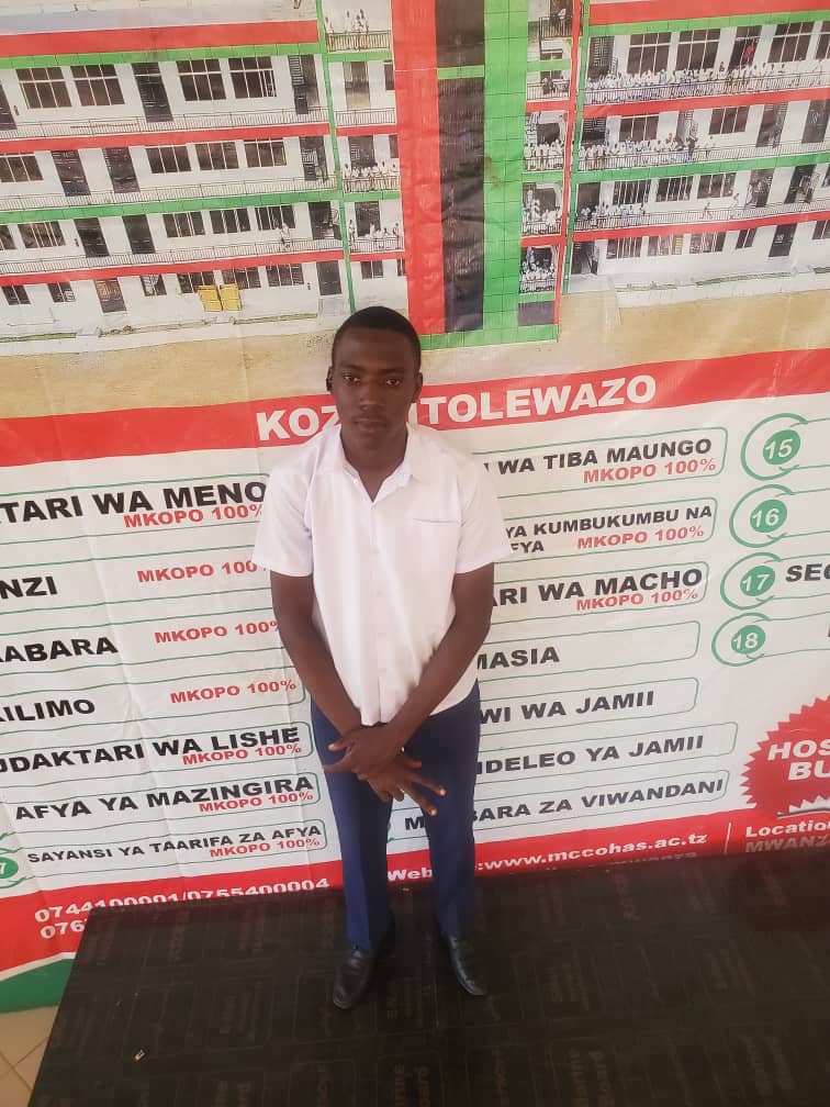 Junior in City College uniform beside the courses banner.