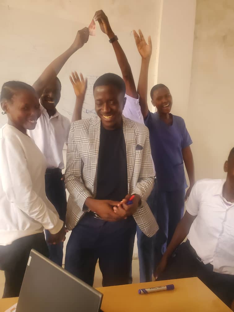 Junior celebrating success with fellow students.